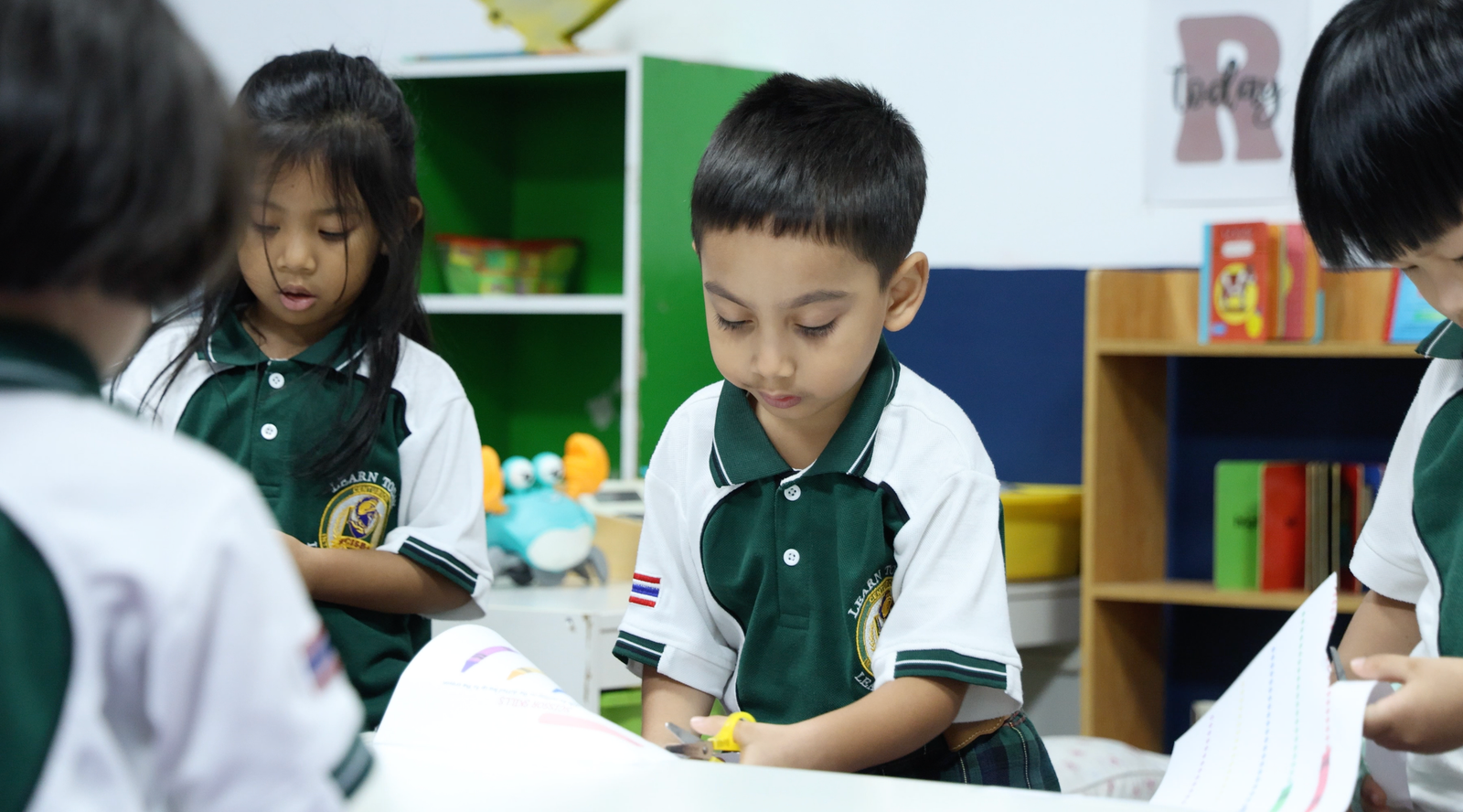 CISB student arriving on campus with a school bag